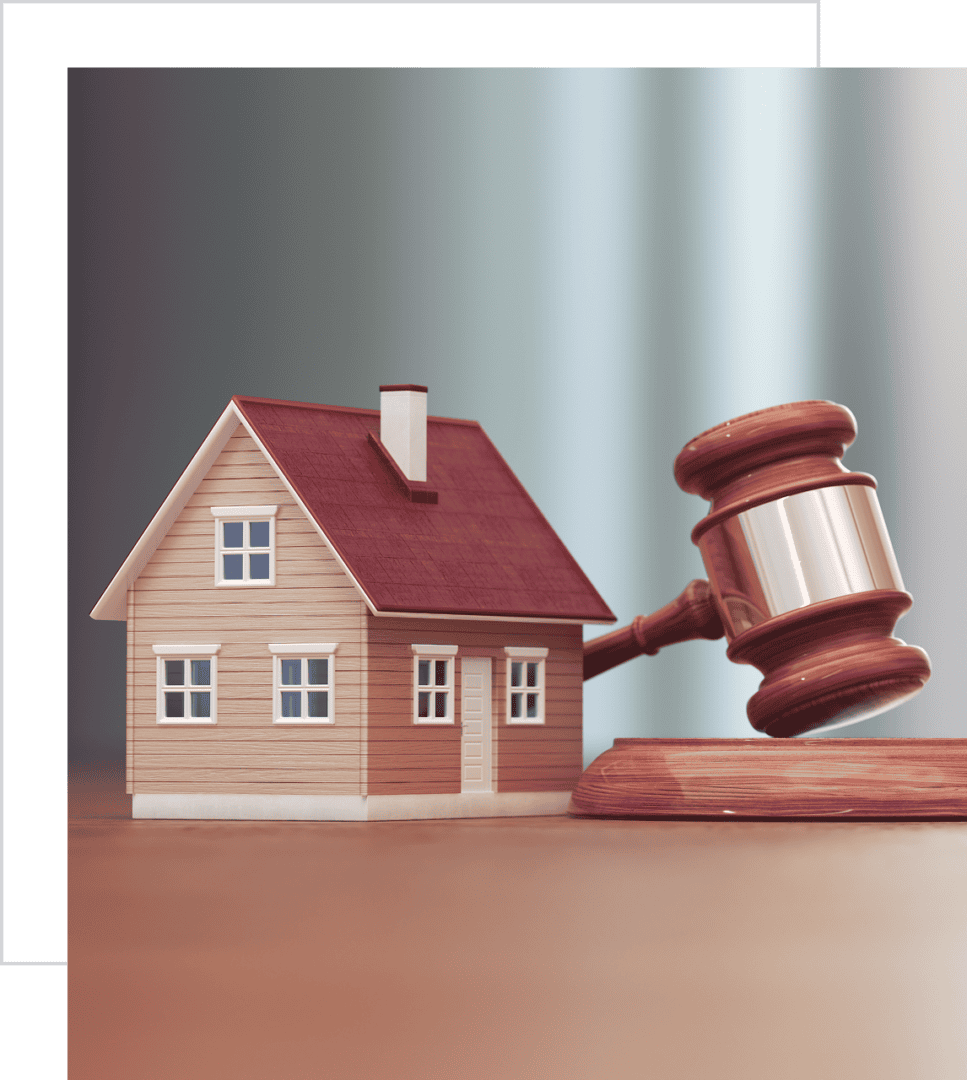 House model with judge's gavel nearby.
